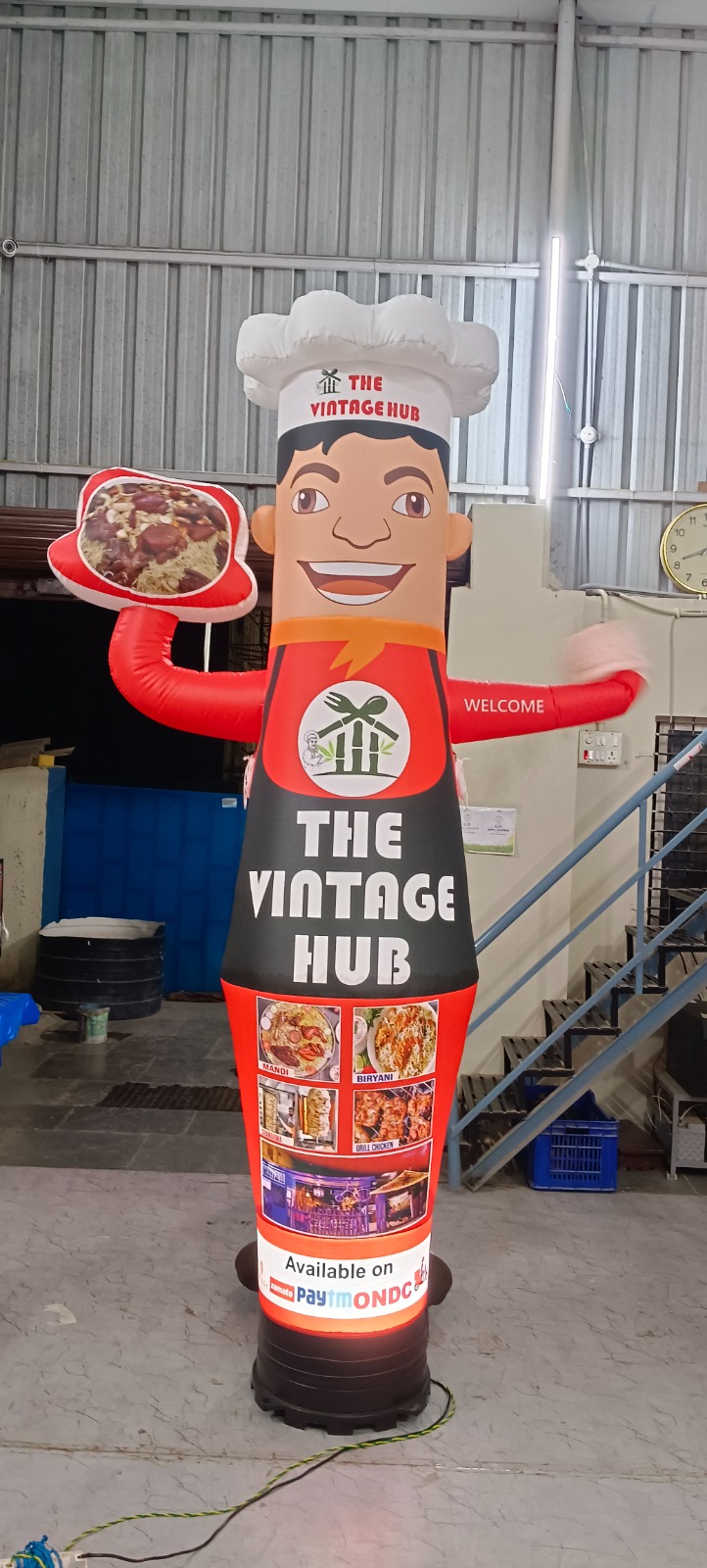The Vintage Hub restaurant chef air dancer inflatable with menu photos