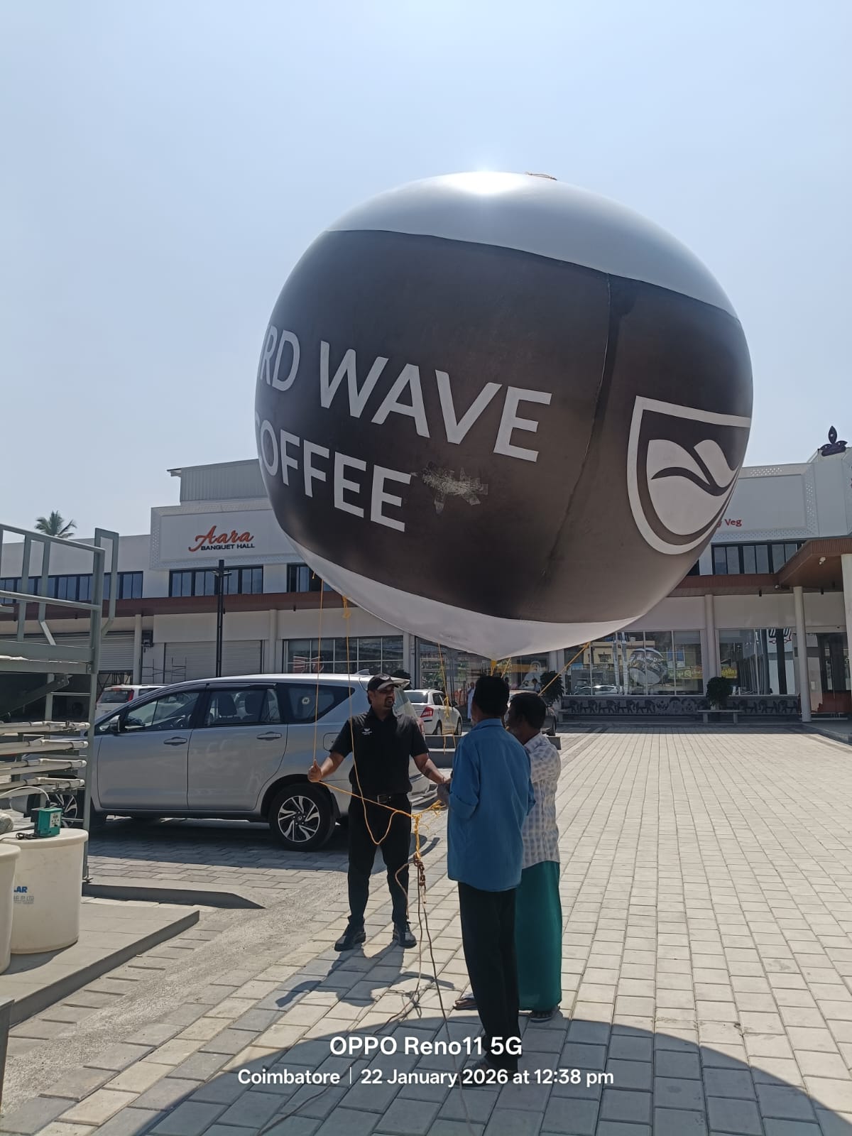 Third Wave Coffee branded sky advertising balloon installed outside a cafe in Coimbatore