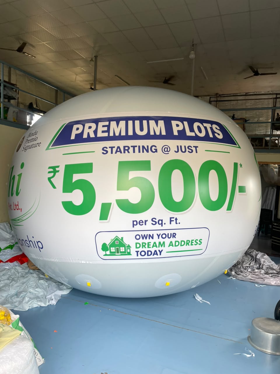 Premium Plots real estate advertising balloon printed with pricing offer